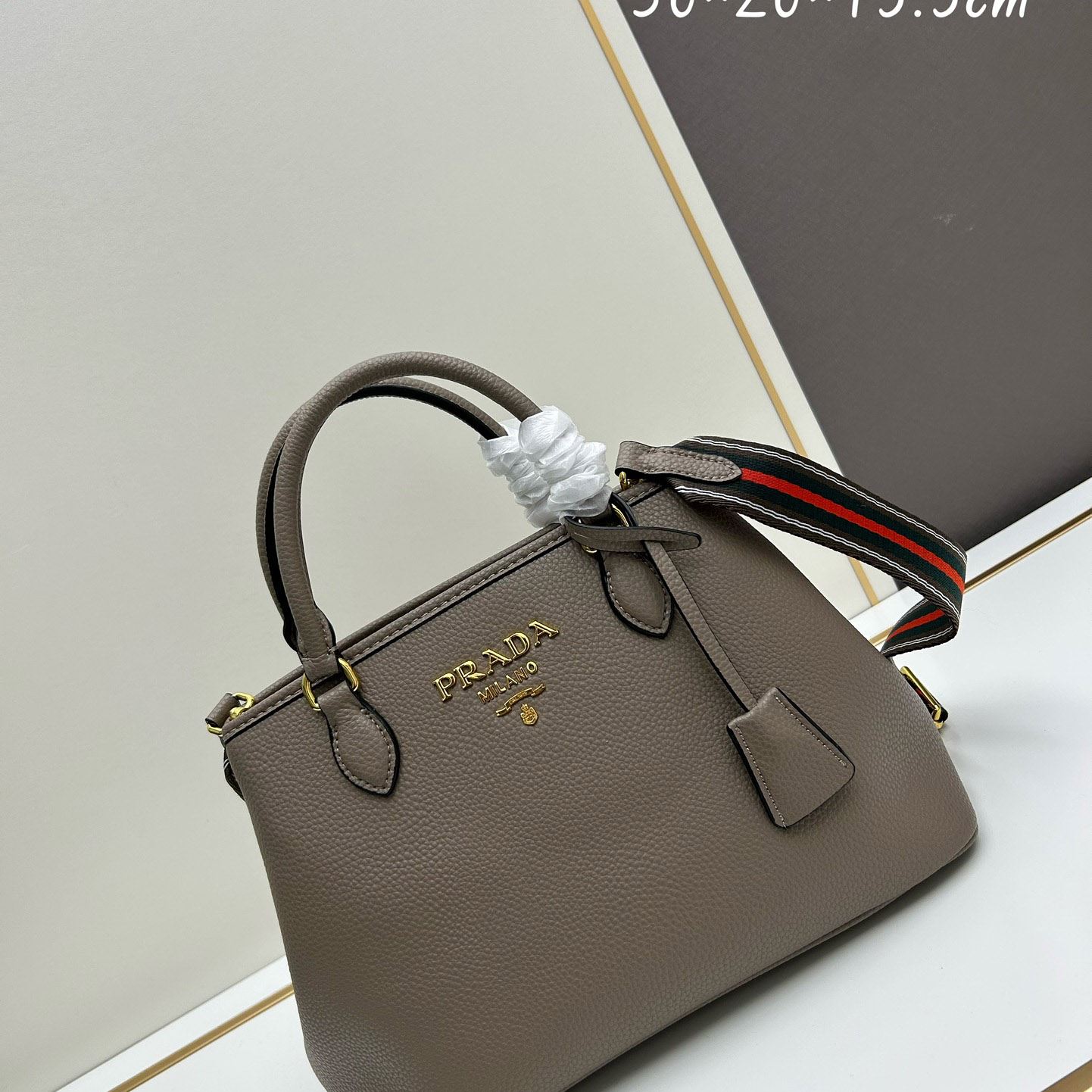 Pra*a top handle bags